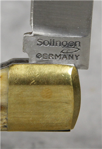 Solingen Germany Jigged Bone Folding  with Brass Bolsters