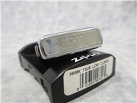 LUCKY/FOUR LEAF CLOVER Black Ultralite Chip Polished Chrome Lighter (Zippo, 360BK, 2005)
